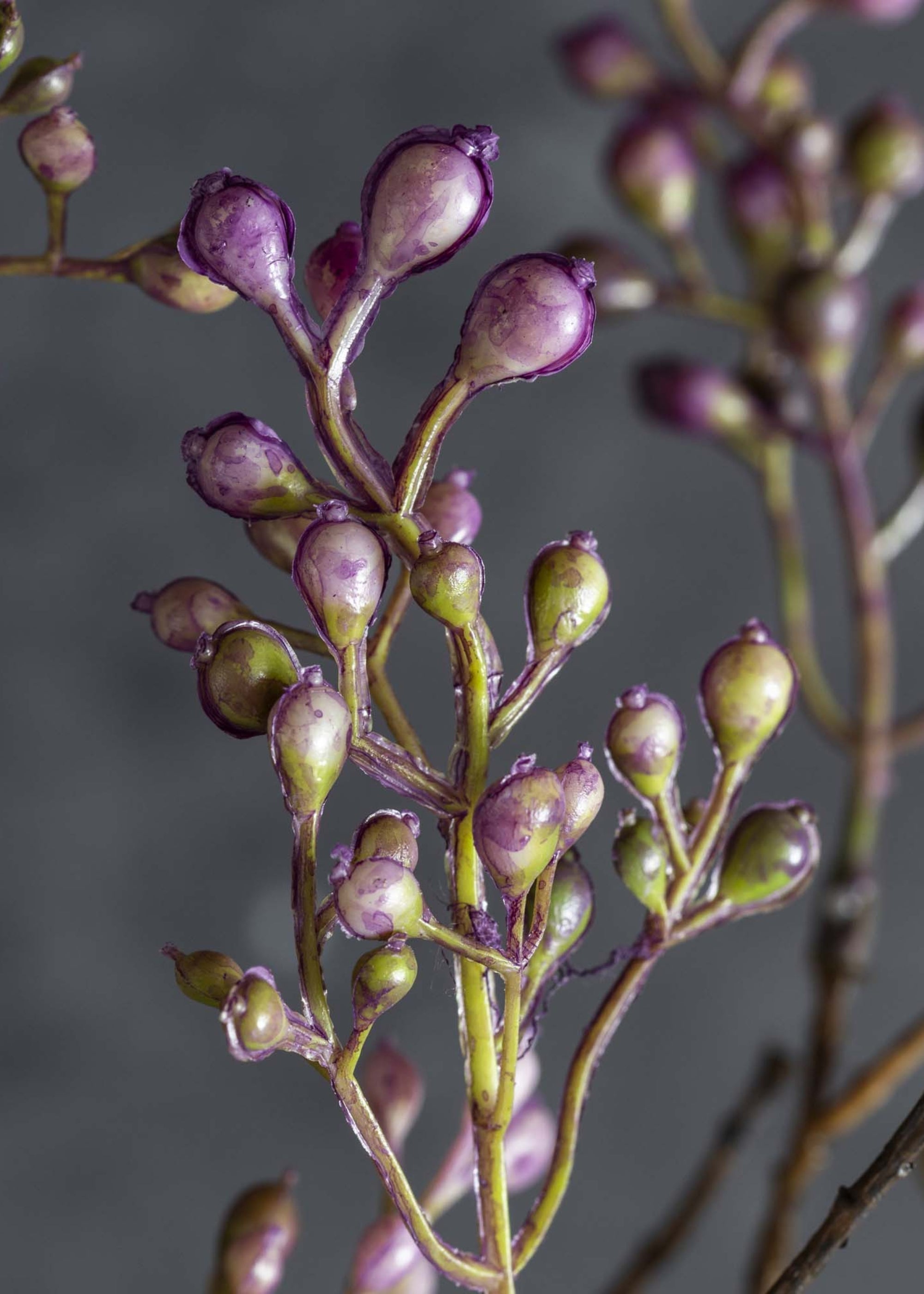 Purple artificial branch for mantel and table decor
