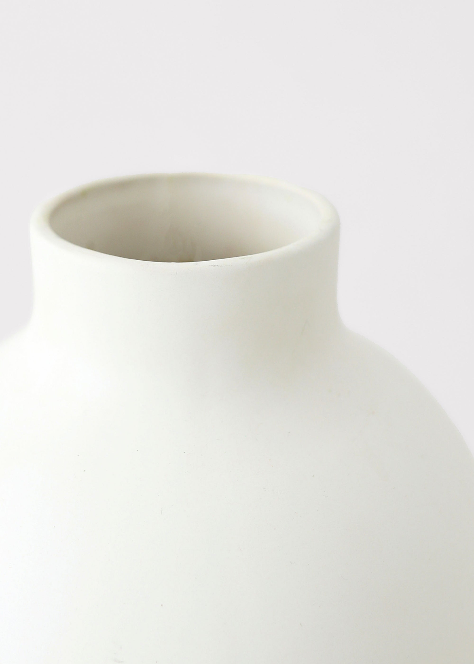 Cream ceramic vessel for dried stems and greenery