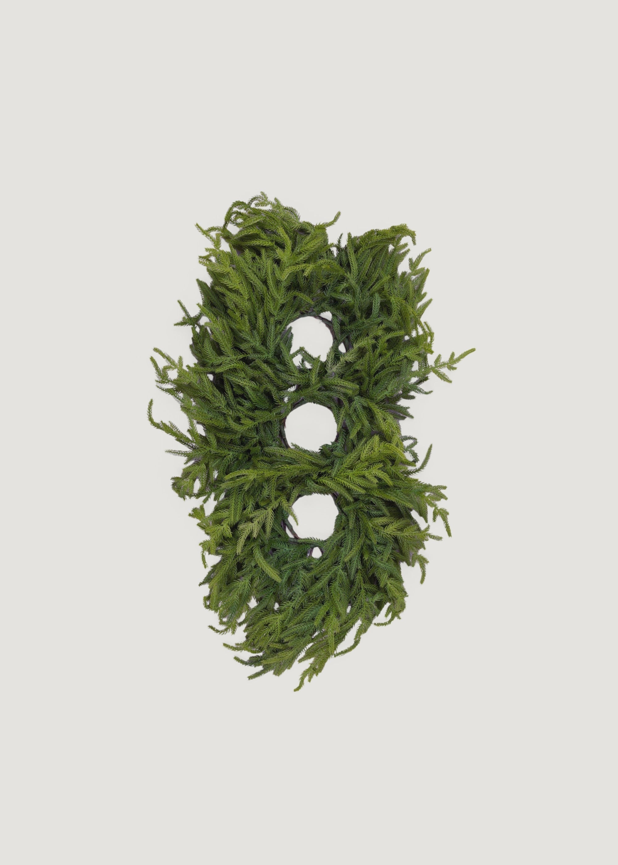 Artificial pine table centerpiece for holiday dinner decor