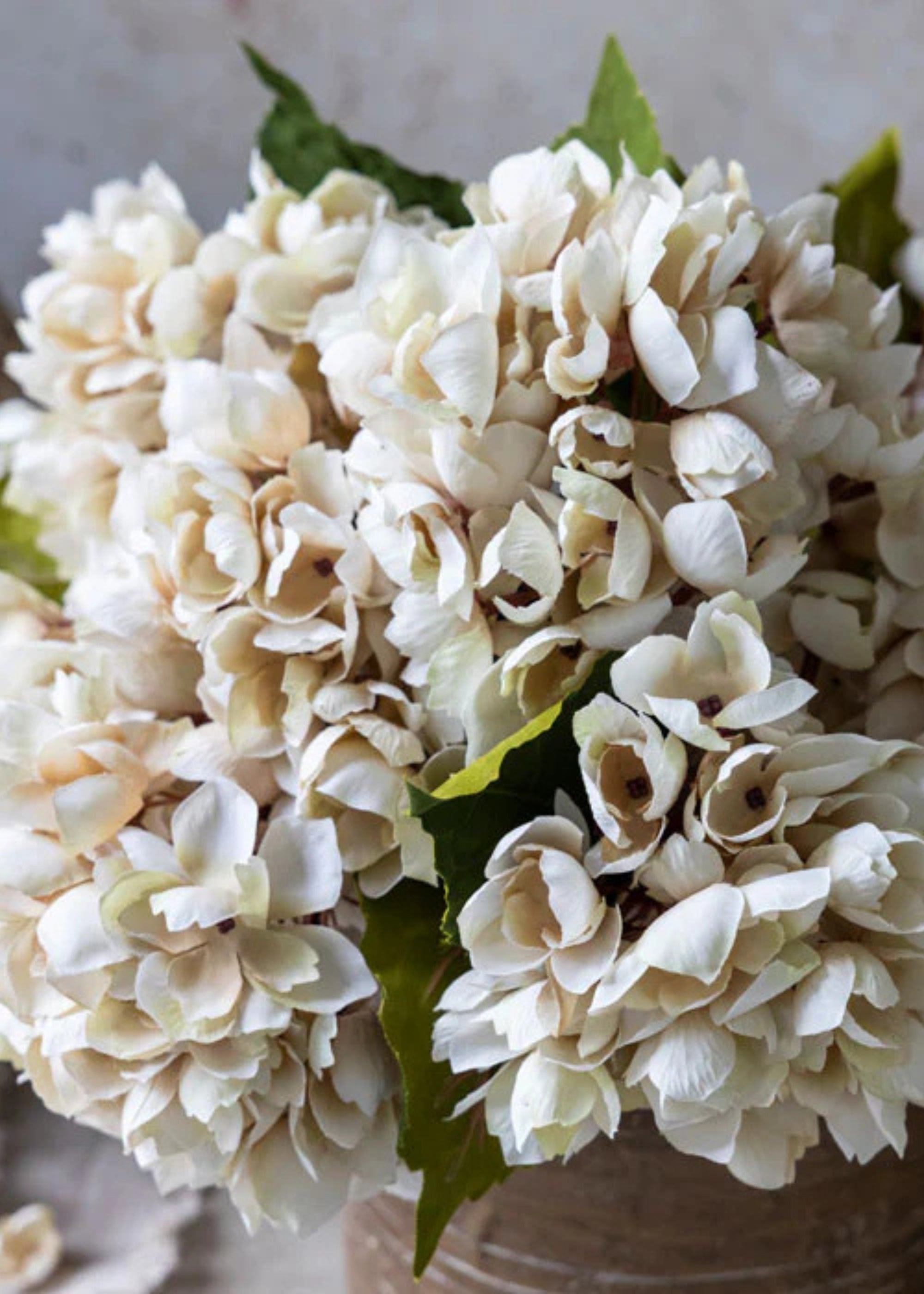 Artificial hydrangea stem for soft table arrangement