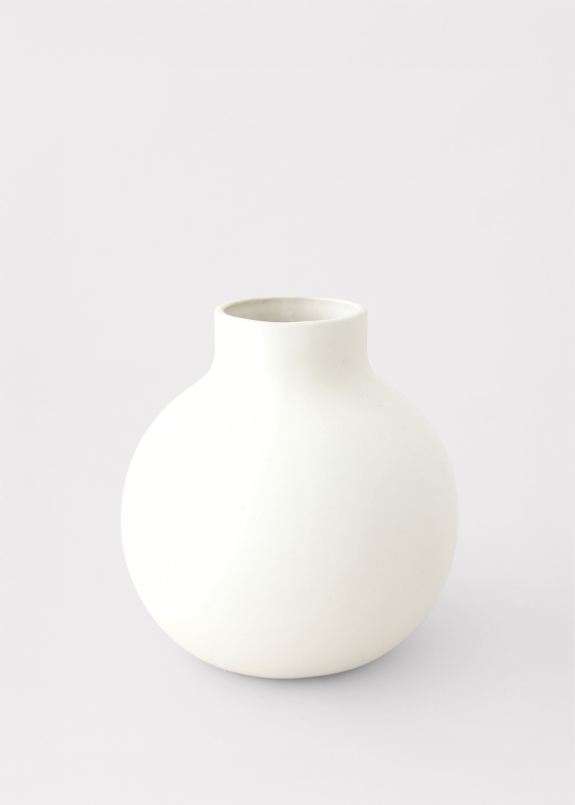 Creamy white round ceramic vase for faux flower arrangements