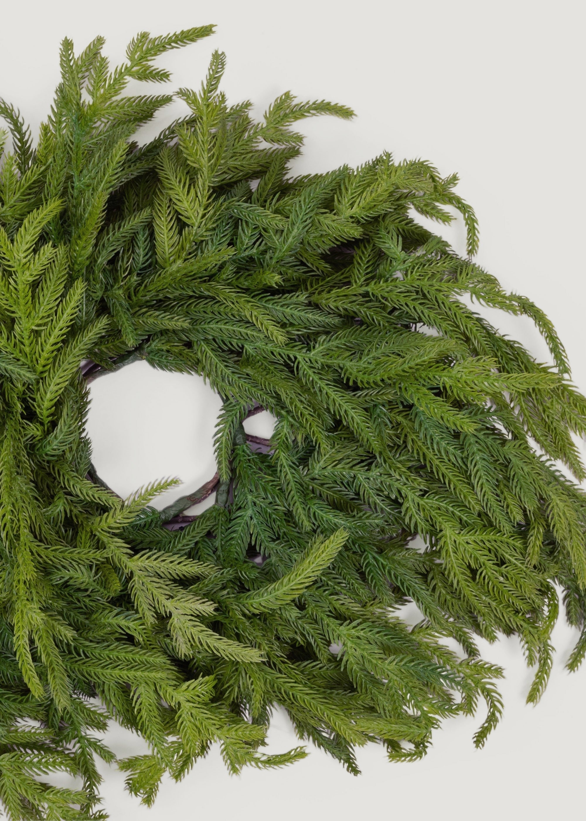 Green faux candle centerpiece for winter wedding styling