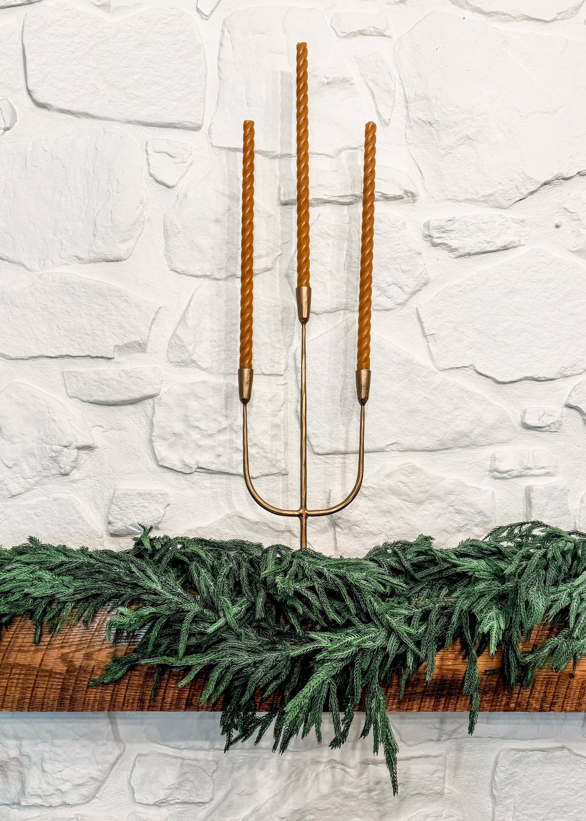 Gold metal candle holder for holiday centerpiece styling